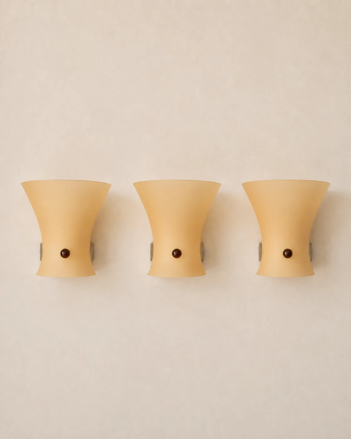 Italian vintage Itre amber glass wall lights.