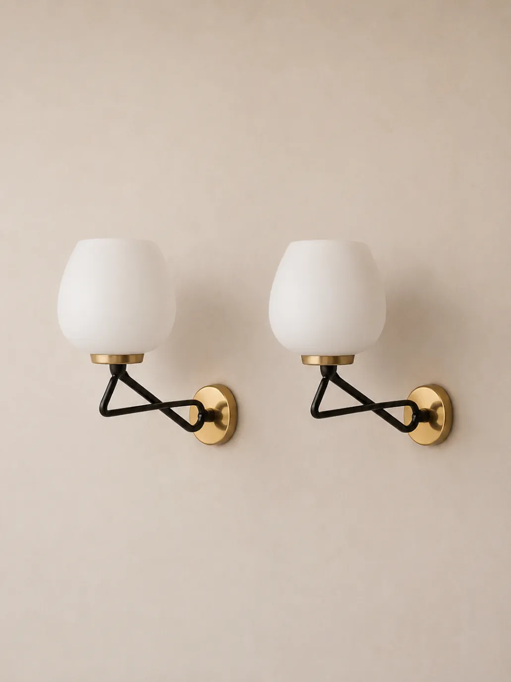 Italian 1950s metal and glass wall sconces.